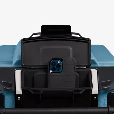 Dry Storage View | Trailmate® Journey 70 Qt Cooler::Modern Blue::Locking dry storage compartment